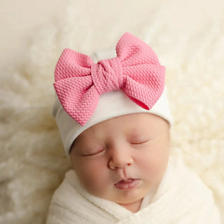 Pink baby shop hat with bow